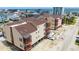 Beautiful aerial view showing patios and pool and the beach in the distance at 212 29Th Ave. N # 204, North Myrtle Beach, SC 29582