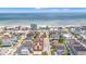 Coastal town aerial view, highlighting beach proximity and neighborhood layout with ocean backdrop at 212 29Th Ave. N # 204, North Myrtle Beach, SC 29582