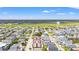 Aerial view of a town with mixed housing near marshes and waterways, showing community layout at 212 29Th Ave. N # 204, North Myrtle Beach, SC 29582