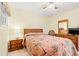 Bedroom with neutral walls and wooden furniture at 212 29Th Ave. N # 204, North Myrtle Beach, SC 29582
