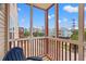 This screened patio includes seating and a nice view of the neighborhood at 212 29Th Ave. N # 204, North Myrtle Beach, SC 29582