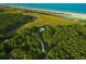 Expansive property with a house nestled amidst lush greenery, offering both seclusion and natural beauty at 288 Tipperary Pl., Pawleys Island, SC 29585
