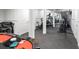 Finished basement space featuring a gym area with workout equipment and durable flooring at 288 Tipperary Pl., Pawleys Island, SC 29585