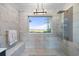 Modern bathroom with a large window, walk-in shower, and sleek design at 288 Tipperary Pl., Pawleys Island, SC 29585