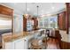 Stylish kitchen with granite countertops, stainless steel appliances, and a breakfast bar with seating at 288 Tipperary Pl., Pawleys Island, SC 29585