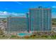 Oceanfront resort featuring multiple pools, beach access, and high-rise condo buildings with balconies at 3000 N Ocean Blvd. # 1127, Myrtle Beach, SC 29577