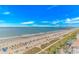 A high-angle view captures the beautiful beach and ocean at 3000 N Ocean Blvd. # 1127, Myrtle Beach, SC 29577