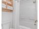 Bright bathroom with a shower and shelf with clean, folded white towels at 3000 N Ocean Blvd. # 1127, Myrtle Beach, SC 29577