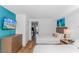 Comfortable bedroom with two beds, modern furnishings, and a view into the adjoining kitchen area at 3000 N Ocean Blvd. # 1127, Myrtle Beach, SC 29577