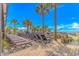 Resort deck with lounge chairs overlooking sandy beach and ocean views under clear blue skies at 3000 N Ocean Blvd. # 1127, Myrtle Beach, SC 29577