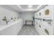 Clean laundry room featuring multiple rows of well-maintained, commercial-grade washing machines at 3000 N Ocean Blvd. # 1127, Myrtle Beach, SC 29577
