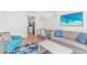Cozy living room with views into kitchen, features comfortable seating and stylish decor at 3000 N Ocean Blvd. # 1127, Myrtle Beach, SC 29577