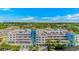 Multi-level parking garage offering ample space for vehicles, surrounded by lush greenery at 3000 N Ocean Blvd. # 1127, Myrtle Beach, SC 29577