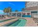 Charming poolside bar with palm trees, comfortable lounge chairs, and a inviting outdoor ambiance at 3000 N Ocean Blvd. # 1127, Myrtle Beach, SC 29577