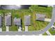 An aerial view showing the rooftops, driveways, and road of a subdivision at 305 Forestbrook Cove Circle, Myrtle Beach, SC 29588