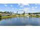 Water view from backyard between houses with neighborhood pond and fountain at 305 Forestbrook Cove Circle, Myrtle Beach, SC 29588