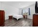 Bright bedroom with hardwood floors, natural light, and ample closet space at 305 Forestbrook Cove Circle, Myrtle Beach, SC 29588