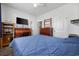 Bedroom with ceiling fan and wood furniture at 305 Forestbrook Cove Circle, Myrtle Beach, SC 29588