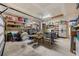 Spacious garage filled with shelves and household tools and containers at 305 Forestbrook Cove Circle, Myrtle Beach, SC 29588