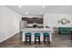 Modern kitchen with stainless steel appliances, granite countertops, and a stylish center island at 305 Forestbrook Cove Circle, Myrtle Beach, SC 29588