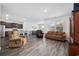 Inviting open-concept living space with hardwood floors, stylish furniture, and natural light at 305 Forestbrook Cove Circle, Myrtle Beach, SC 29588