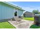 Rear door of home that opens onto a concrete patio in backyard at 308 Sanders Ct., Mullins, SC 29574