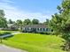 Charming home with a spacious lawn and curb appeal in a residential neighborhood at 308 Sanders Ct., Mullins, SC 29574