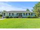Charming single-story home with a well-manicured front lawn and basketball hoop at 308 Sanders Ct., Mullins, SC 29574