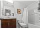 Bathroom with a combination tub and shower, and a dark wood vanity at 310 Lockerbie Ct. # 1057, Myrtle Beach, SC 29577