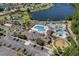 Aerial view of community pool and amenities: splash pad, lazy river, playground, tennis and bocce ball courts at 310 Lockerbie Ct. # 1057, Myrtle Beach, SC 29577