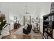 Spacious living room featuring high ceilings, comfortable seating, and an open floor plan at 310 Lockerbie Ct. # 1057, Myrtle Beach, SC 29577