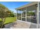 Exterior view of screened in back porch and lawn at 310 Lockerbie Ct. # 1057, Myrtle Beach, SC 29577