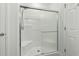 Bright white shower with glass door and chrome fixtures inside bathroom at 310 Lockerbie Ct. # 1057, Myrtle Beach, SC 29577