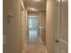 Hallway leads to a bedroom, bathed in natural light at 3137 Tiger Tail Rd., Conway, SC 29526