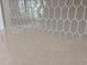 Close-up of a white quartz countertop and decorative backsplash at 3137 Tiger Tail Rd., Conway, SC 29526