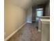 This carpeted hallway leads to another room and has neutral paint at 3139 Tiger Tail Rd., Conway, SC 29526