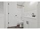 Bright bathroom featuring a shower-tub combo, white vanity, and modern fixtures at 324 Camellia Ave., Marion, SC 29571
