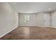 This spacious bedroom offers a clean, modern look with wood floors and natural light at 324 Camellia Ave., Marion, SC 29571