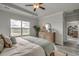 Comfortable bedroom features a large window and a neutral color palette at 339 Garden Grove St, Conway, SC 29526