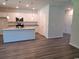 Modern kitchen features white cabinets, granite countertops, and a center island at 339 Garden Grove St, Conway, SC 29526