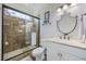 Beautiful bathroom with glass enclosed shower, tiled walls, and a decorative mirror at 350 Saint Julian Ln., Myrtle Beach, SC 29579