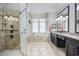 Luxurious bathroom with a soaking tub, walk-in shower, and dual vanities offering a spa-like experience at 350 Saint Julian Ln., Myrtle Beach, SC 29579