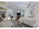 Large bedroom with a bed, office setup, and a relaxing seating area at 350 Saint Julian Ln., Myrtle Beach, SC 29579