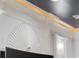 Unique wall and ceiling molding with accent lighting above the fireplace and built-in shelves at 350 Saint Julian Ln., Myrtle Beach, SC 29579