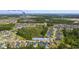 Drone view of neighborhood and home location close to North Myrtle Beach at 3647 Diamond Stars Way, Little River, SC 29566