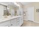 Bright bathroom featuring a double vanity with ample counter space and a walk-in shower for a spa-like experience at 3647 Diamond Stars Way, Little River, SC 29566