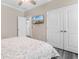 Comfortable bedroom has a wall mounted television, large closet, and light gray flooring at 3647 Diamond Stars Way, Little River, SC 29566
