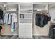Organized walk-in closet with ample shelving, drawers, and hanging space for efficient storage of clothing and accessories at 3647 Diamond Stars Way, Little River, SC 29566