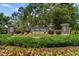 Well-maintained community entrance sign with stone pillars and manicured landscaping at 3647 Diamond Stars Way, Little River, SC 29566