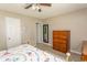 Neutral-toned bedroom featuring plush carpeting and a closet view at 3879 Mallard Way, Little River, SC 29566
